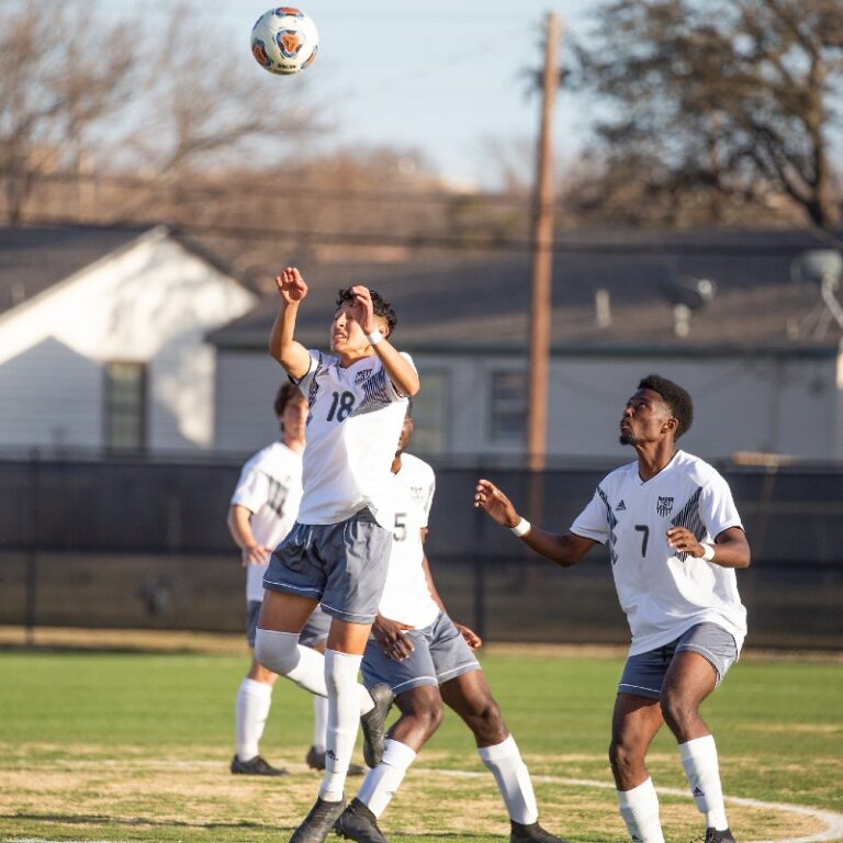 HSU men's soccer team playing.