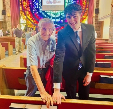 Relatives Charles Love and Seth Tiemeyer pose with their HSU rings.