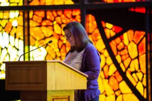 Dr. Tiffany Fink speaking at a previous year's Women's History Month event.