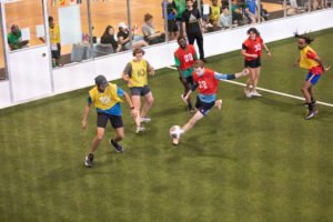 Students playing soccer.