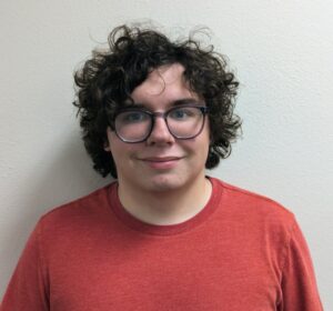 Landry French wearing a red shirt.