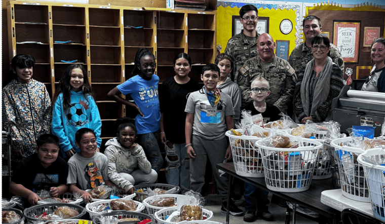 Ortiz E.S. Students enjoying their Thanksgiving baskets