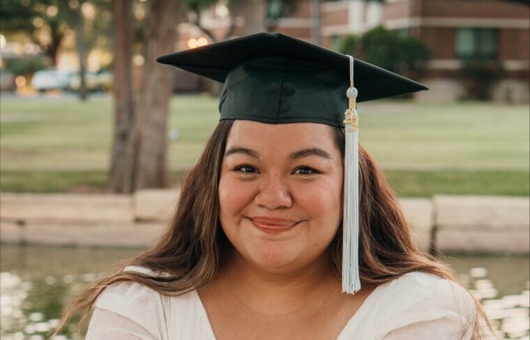 Ariel Klinke wearing her graduation cap and tassel.