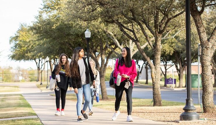 HSU students are walking and talking across the campus.