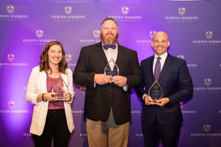 Mrs. Sarah (Wesley) Cameron ’12, Dr. Jordan Daniel ’07, and Dr. Ben Lovvorn ’04 stand together with their awards at the 2024 OYA Awards Banquet.