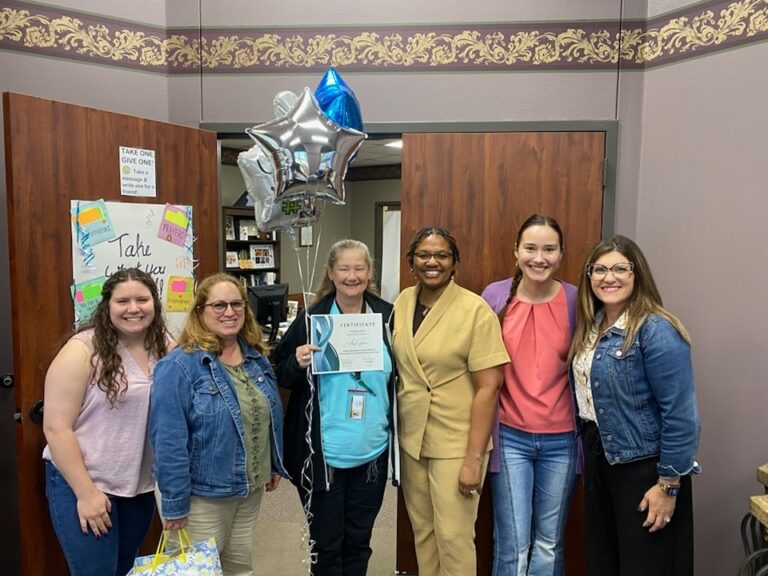 Amy Shelton was surprised by the Prize Patrol letting her know she was nominated as the Social Work Student of the Year.