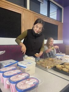 Anderson Hall RD, Chloe Carter preparing an ice cream sandwich