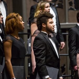 two students singing