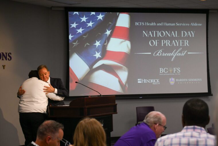 Kevin Dinnin, President and Chief Executive Officer of FirstDay Foundation, awarded a grant to current HSU student Robert Walker.