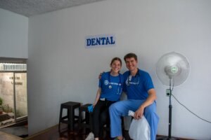 Ashley Wood (L) and Noah Collins (R) pose for a photo between patients.