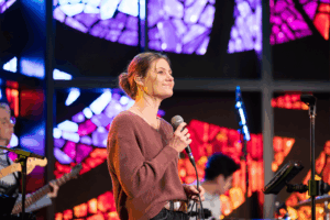 Student Singing at Chapel