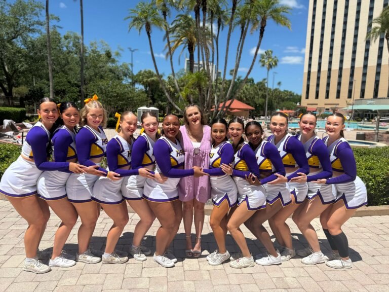 HSU Cheer posed smiling for the national cheer competition