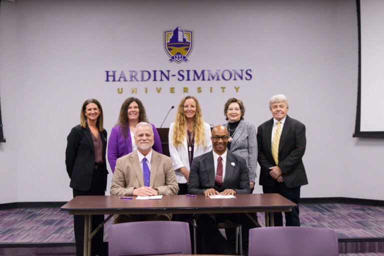 HSU and Ranger college representatives signing an articulation agreement