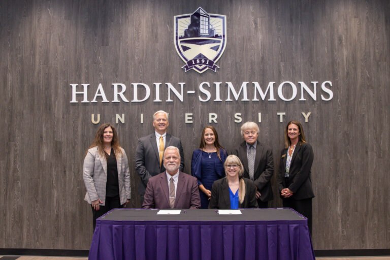 A group photo of staff members.