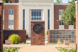 Christlieb medallion in the center of the Alumni Wall