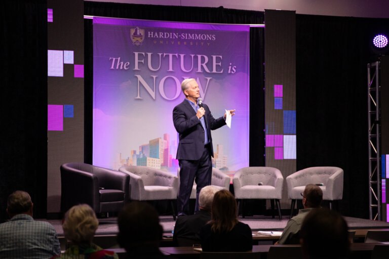 President Bruntmyer speak son stage at The Future is Now summit