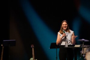 Hannah Lankford on stage for Cornerstone Chapel