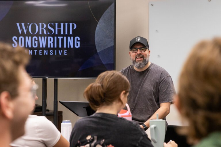Chris Clayton speaking at the Songwriting Workshop to students